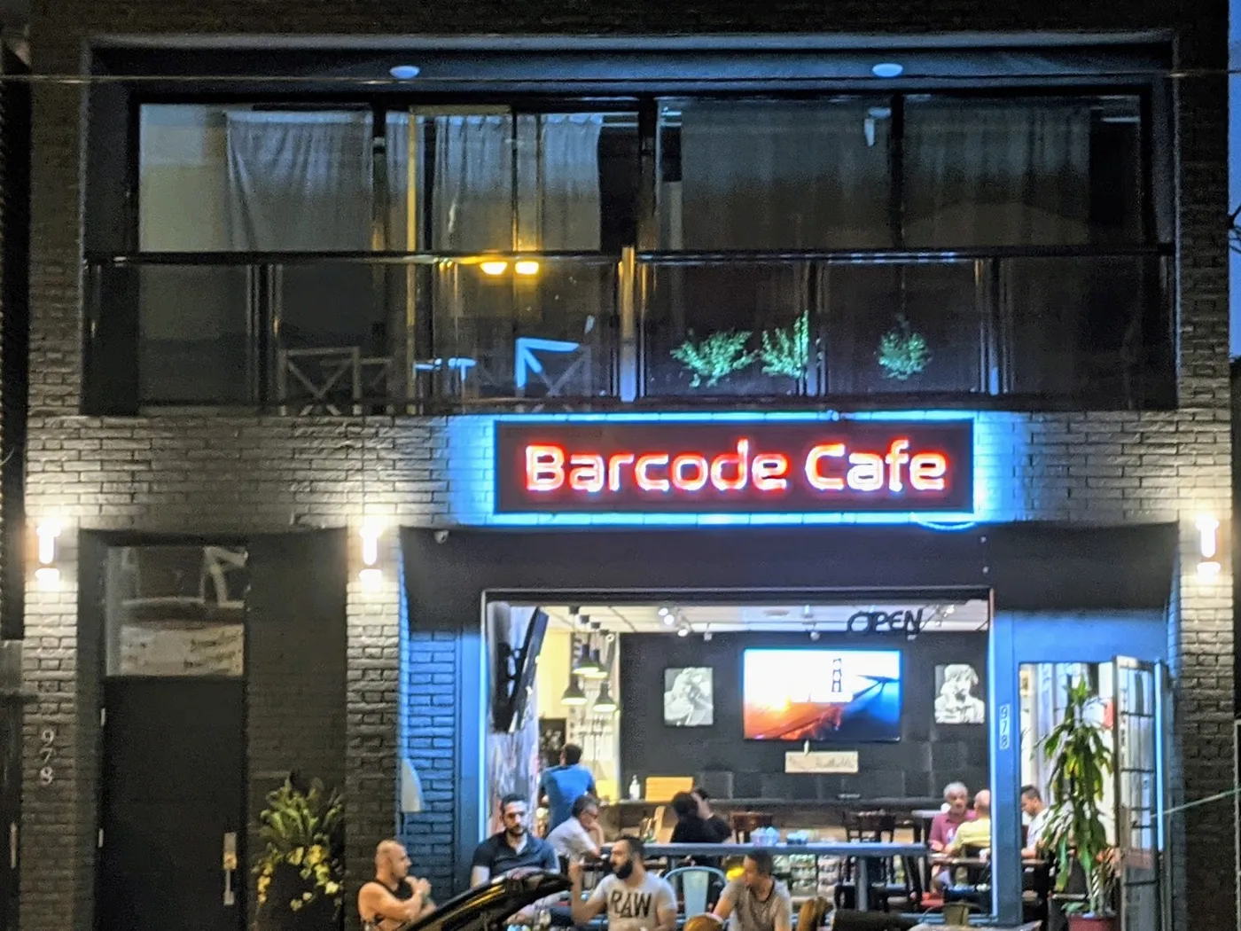 Barcode Cafe on Pape at night